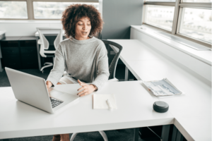 A woman working on a laptop